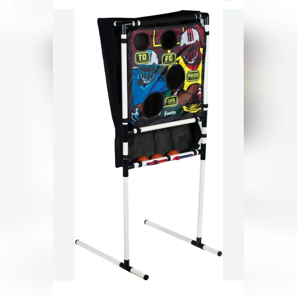 Football toss game in corn hole bag toss. No bags